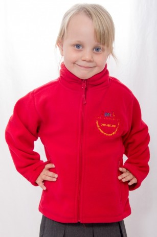 Little girl wearing a red fleece jacket